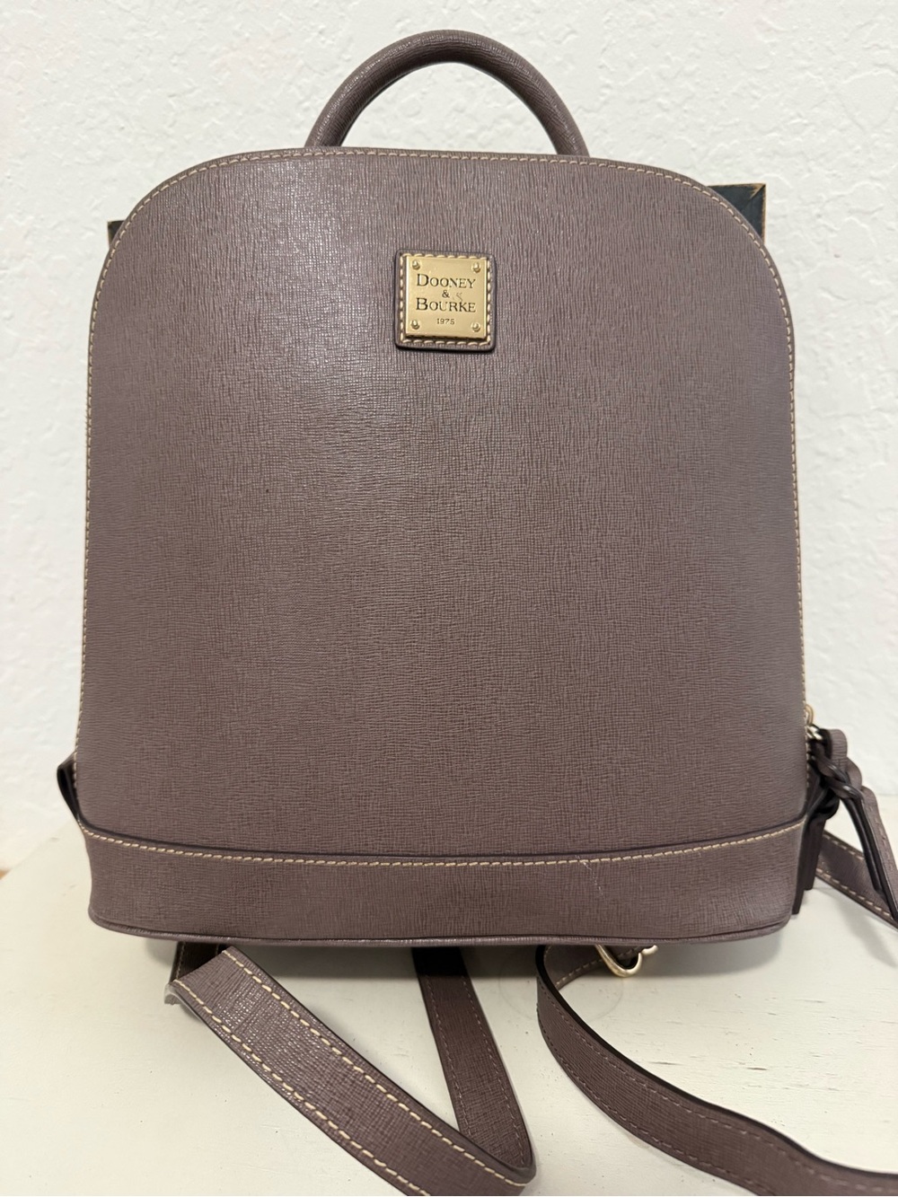 Dooney and Bourke Saffiano leather grayish brown zip nod back back